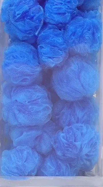 BinWin clear PVC bin filled with blue bath puffs