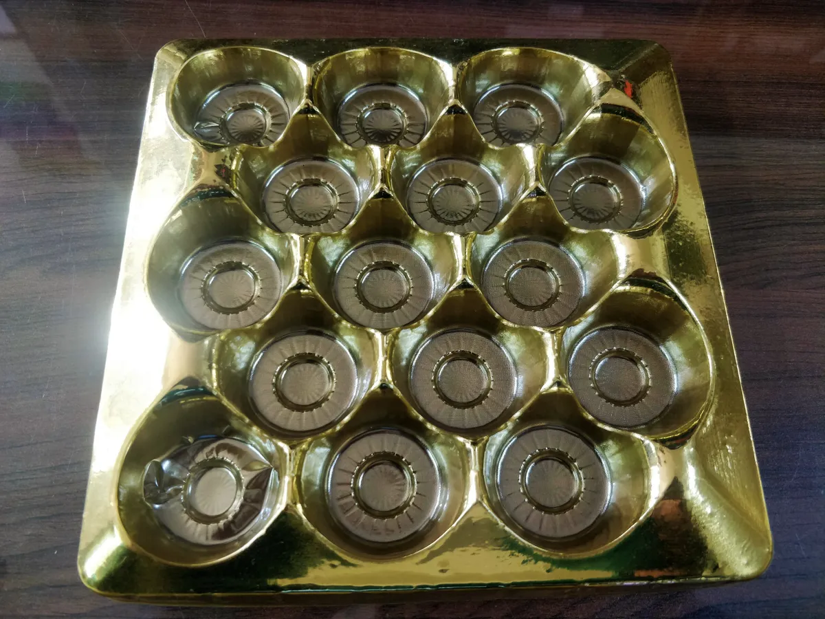 Gold thermoformed chocolate tray made by Eagle Thermo Packaging